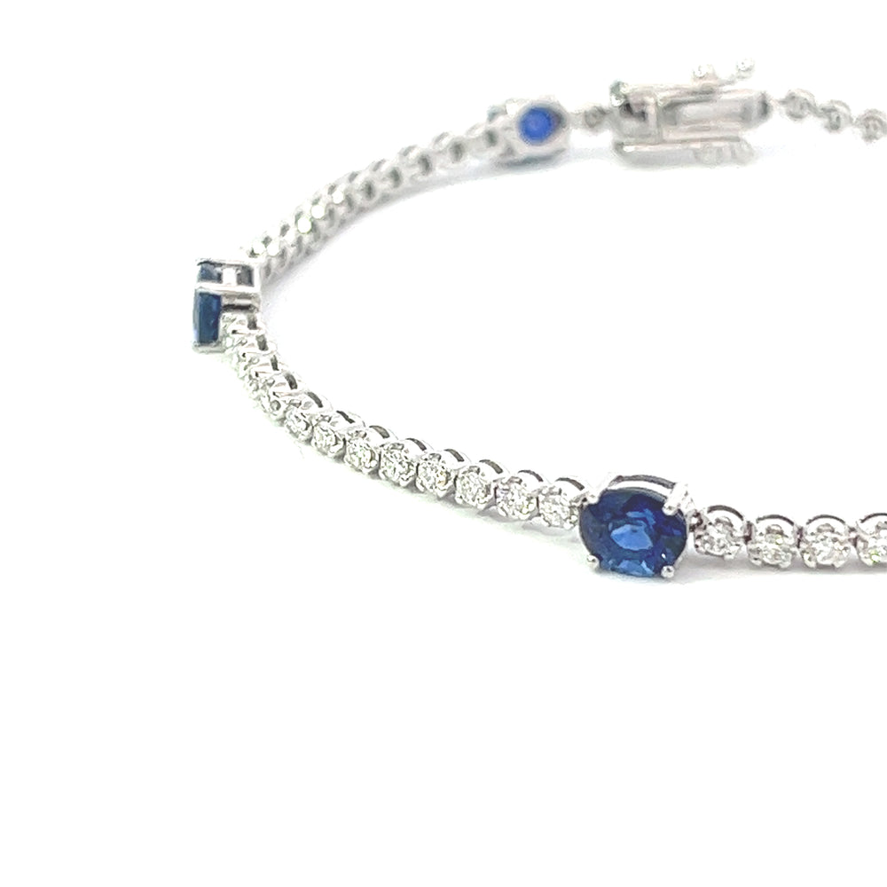 close up of the sapphires and diamonds on a bracelet