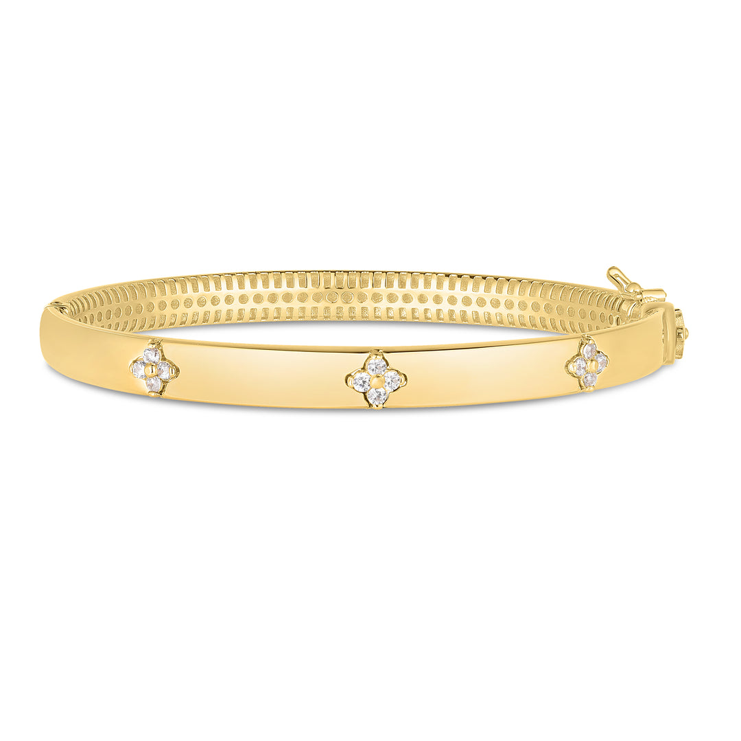Trilogy Diamond Bangle laying on its side in yellow gold