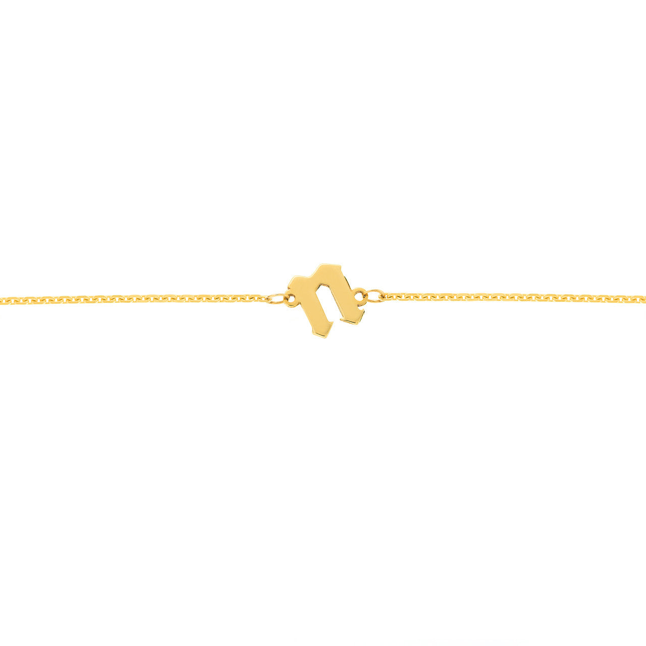 close up picture of the N charm in slanted gothic font