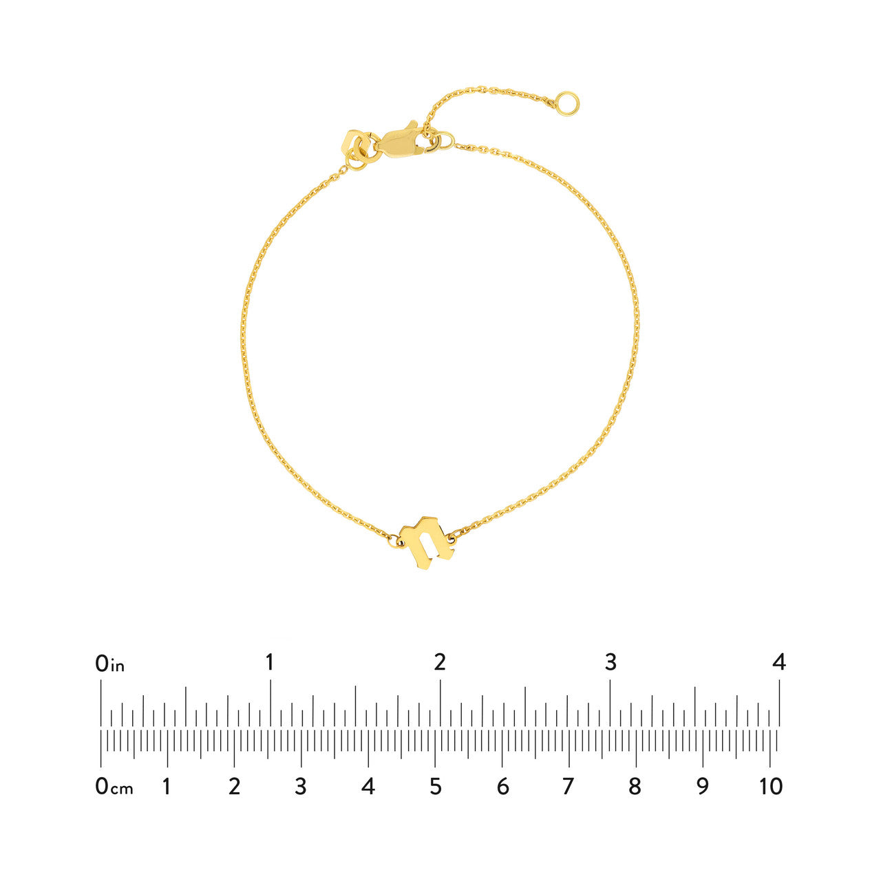 Slanted Gothic Initial Bracelet next to a 4in ruler