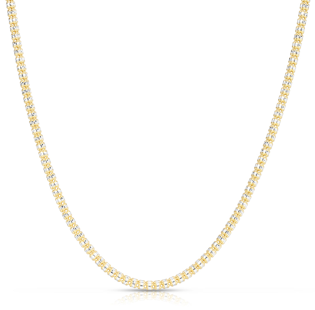 Experience the timeless elegance of our 14K Two-Tone Fancy Ice Chain, meticulously crafted with 3.14mm of Yellow Gold and complemented by a secure Lobster Clasp.