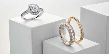 3 piece his and hers wedding ring sets with diamond bands in white and yellow gold.