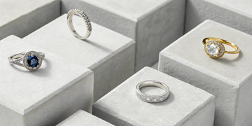 Reset engagement ring ideas after divorce, including new diamond, gold, and sapphire ring designs.