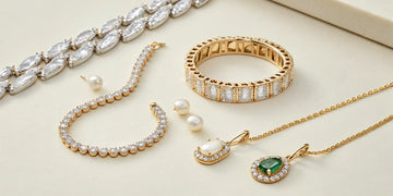 A selection of high-end Mother's Day jewelry gifts featuring diamond bracelets and pearl earrings.