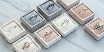 A variety of engagement ring upgrade ideas, including larger center stones, halos, and new settings.