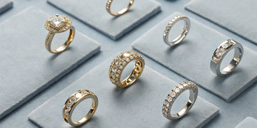 Gold and diamond rings on display offering ideas for a custom ring redesign.