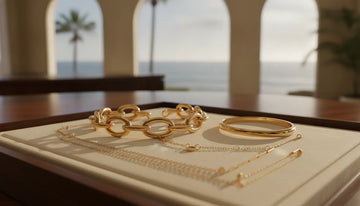 Gold bracelets for women arranged on a fine jewelry tray