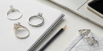 How to custom design an engagement ring with jeweler's sketches and a finished diamond ring.