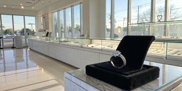 A diamond engagement ring on display at the best jeweler in Oceanside, NY.