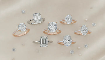 Collection of diamond engagement rings in various shapes including round, princess, cushion, emerald, pear, and oval on a soft neutral background