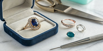 Custom jewelry design in Oceanside, New York with gemstone rings and jeweler's tools.
