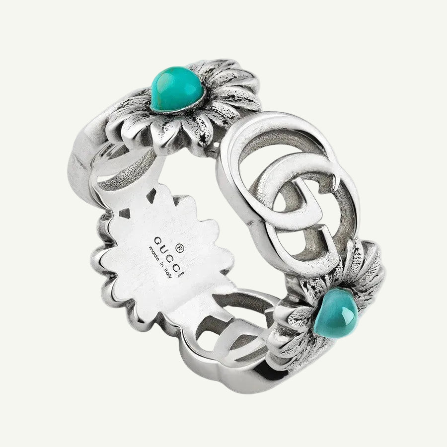 Sterling silver Marmont multi stone flower logo ring.