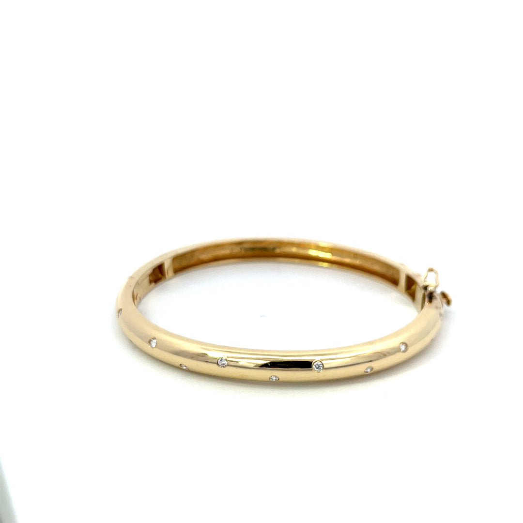 Oval Bangle with .25 Carat Scattered Diamonds