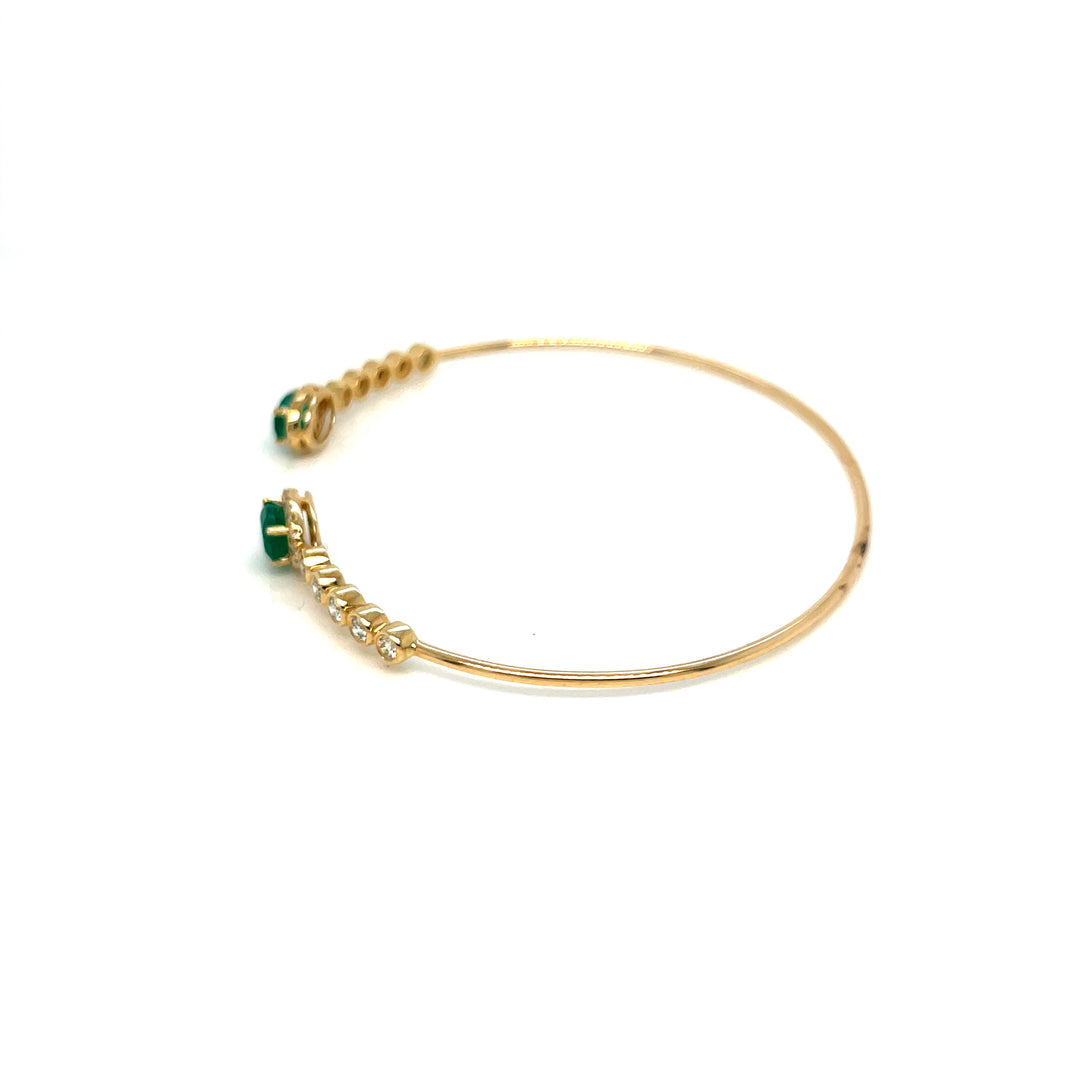 side view of the emerald and diamond bracelet