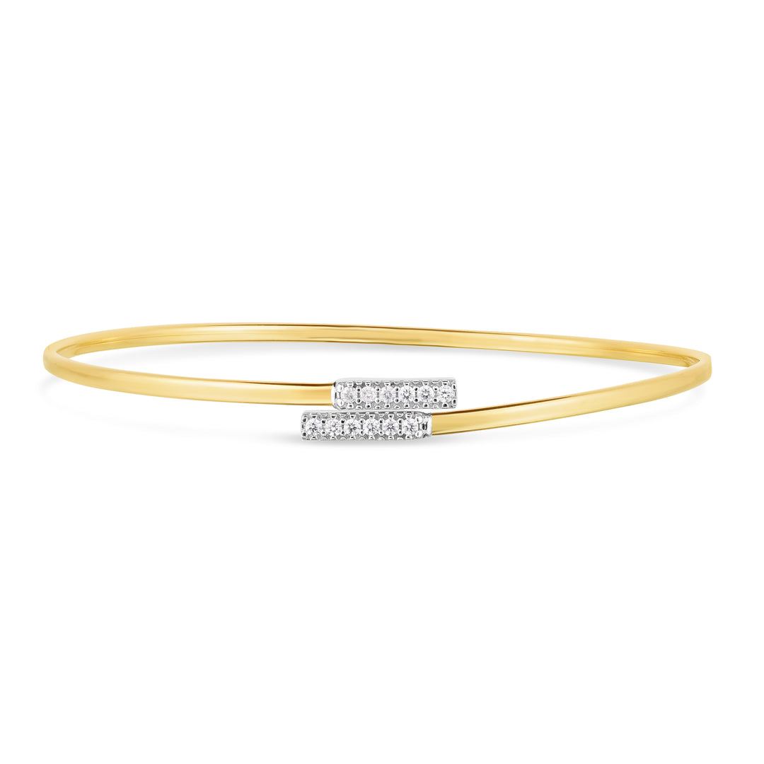Indulge in the luxurious sophistication of our Diamond Bypass Bar Bangle in 14K Gold . Crafted with elegance and adorned with exquisite diamonds, this bangle exudes a sense of exclusivity and opulence.