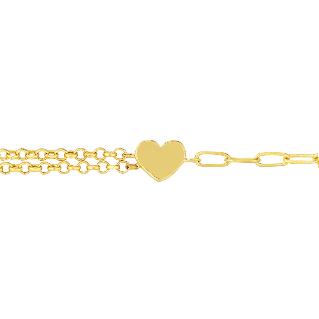 The 50/50 Paper Clip + Double Rolo Heart Bracelet from Olas d'Oro is a perfect blend of style and love. 