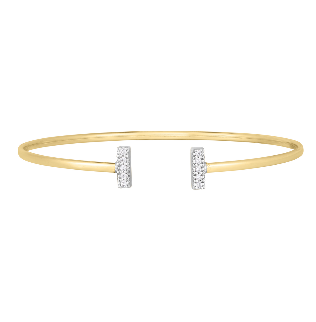 Indulge in luxury with our exquisite Diamond Bar Bangle Bracelet. Made from the finest 14K gold, this bangle is adorned with dazzling diamonds and features a unique tee bar design.