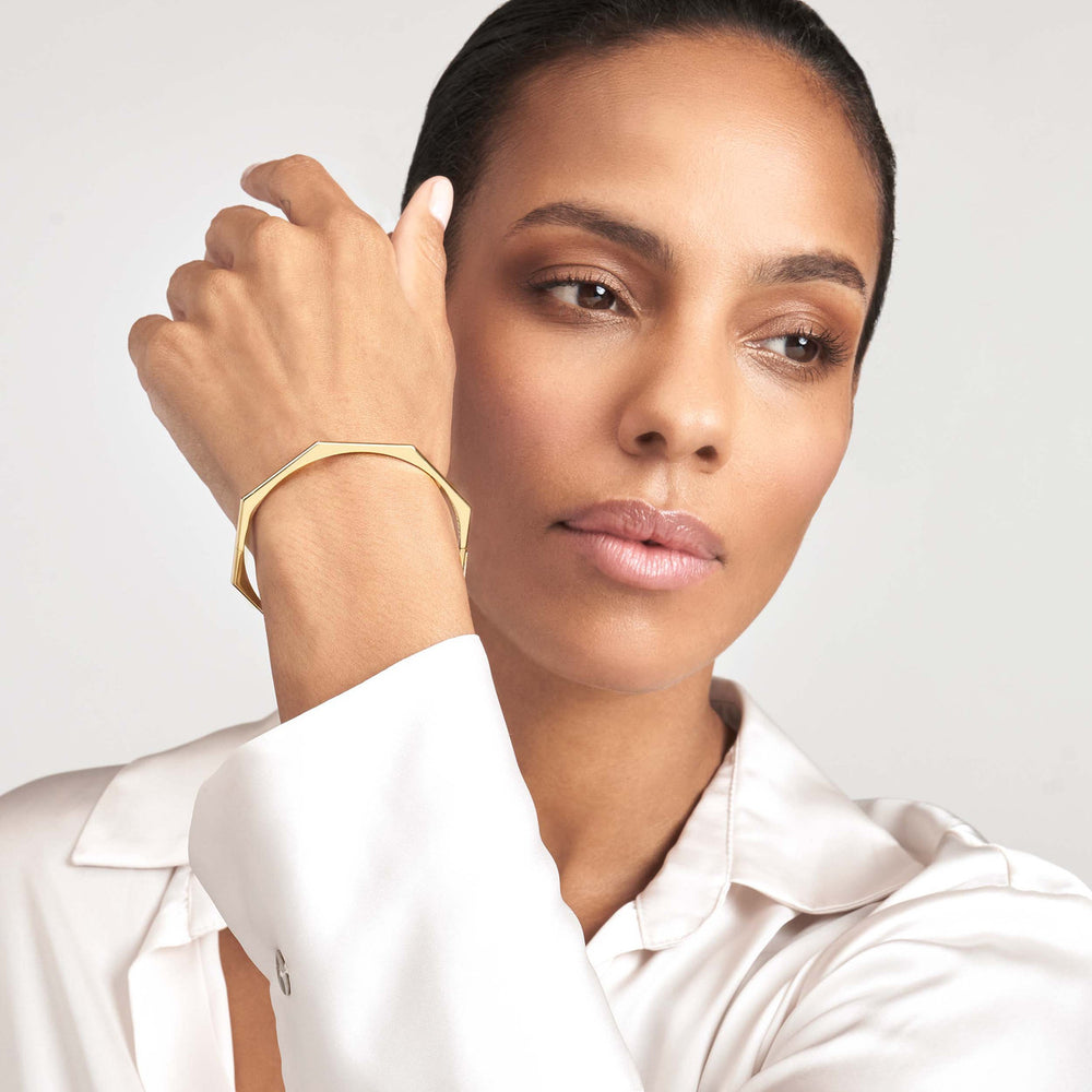 woman modeling the Geometric Octagon Bangle Bracelet on her wrist