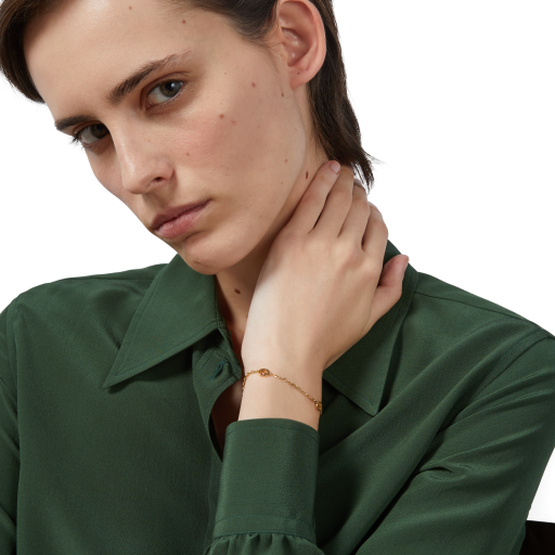 person modeling the Gucci Interlocking Mulit Gg Bracelet on their wrist